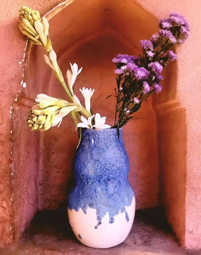 blue ceramic vase with textured design
